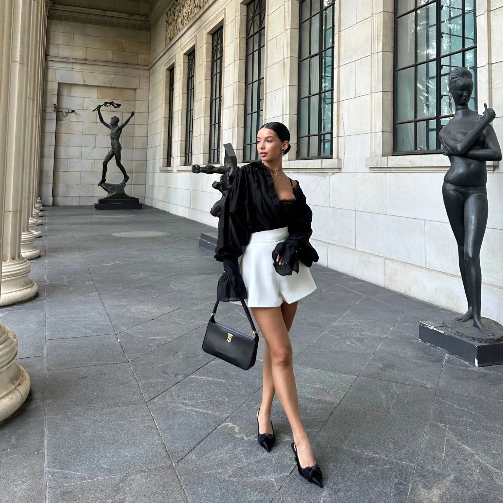 Isabella oversized blouse met striklint en pofmouwen