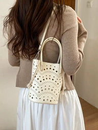 Lara hollow-out bucket bag